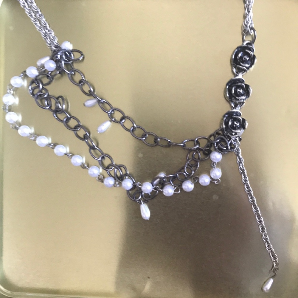 Multi strand, asymmetrical rose and pearl necklace